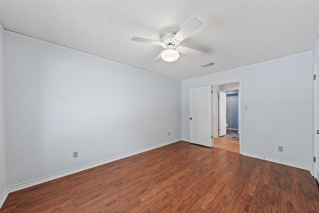 11105 Highview Dr, Belton, TX 76513 - empty room featuring wood finished floors, a textured ceiling, ceiling fan, and baseboards
