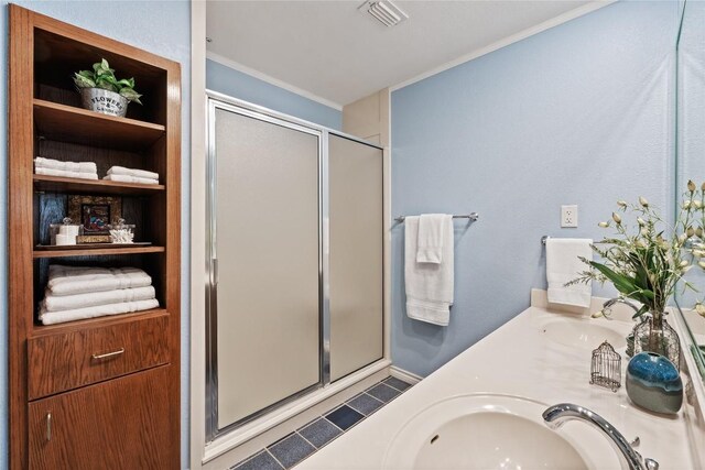 11105 Highview Dr, Belton, TX 76513 - full bath featuring a shower stall, ornamental molding, double vanity, and tile patterned floors