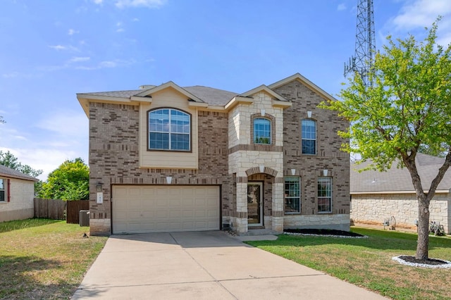 145 Trinity Dr, Kyle, TX 78640 - french provincial home with concrete driveway, a garage, brick siding, and central AC
