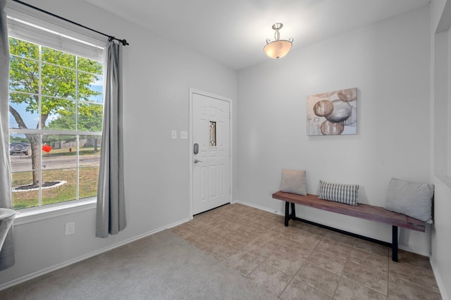 145 Trinity Dr, Kyle, TX 78640 - foyer entrance featuring baseboards and light tile patterned flooring