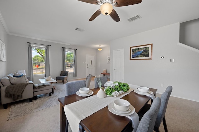 145 Trinity Dr, Kyle, TX 78640 - dining room featuring light carpet, a ceiling fan, and baseboards