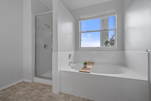 145 Trinity Dr, Kyle, TX 78640 - full bath featuring a stall shower, a garden tub, and tile patterned floors