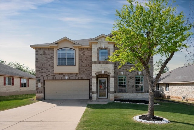 145 Trinity Dr, Kyle, TX 78640 - french country style house with driveway, an attached garage, a front yard, cooling unit, and stone siding