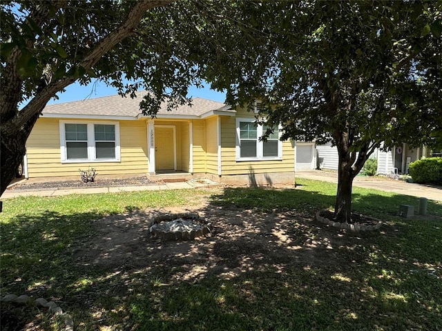 12000 Briarcreek Loop, Manor, TX 78653 - view of front of property featuring a garage, concrete driveway, and a front lawn