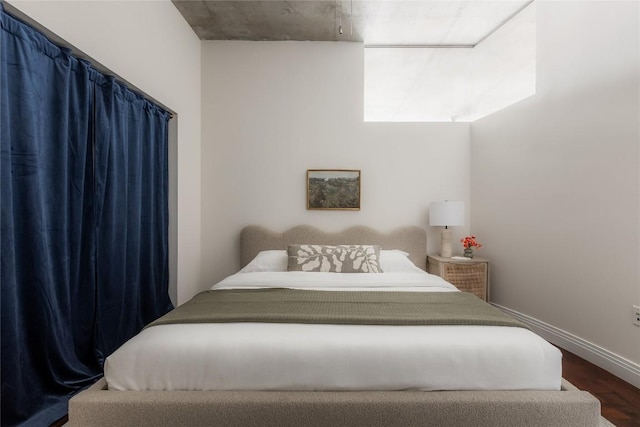 360 Nueces St Unit 1503, Austin, TX 78701 - bedroom with wood finished floors and baseboards