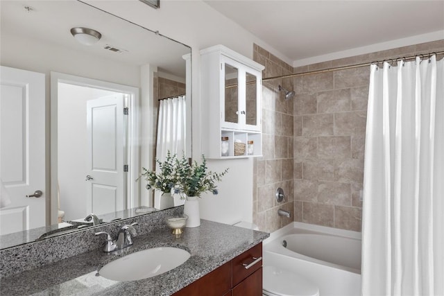360 Nueces St Unit 1503, Austin, TX 78701 - full bath featuring vanity, toilet, and shower / bath combo with shower curtain