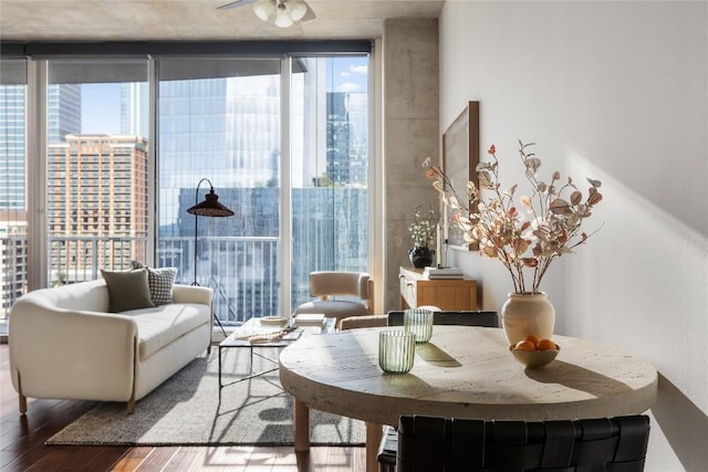 360 Nueces St Unit 1503, Austin, TX 78701 - dining area with wood finished floors, expansive windows, and ceiling fan