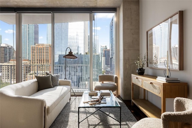 360 Nueces St Unit 1503, Austin, TX 78701 - living room featuring floor to ceiling windows, a view of city, and wood finished floors