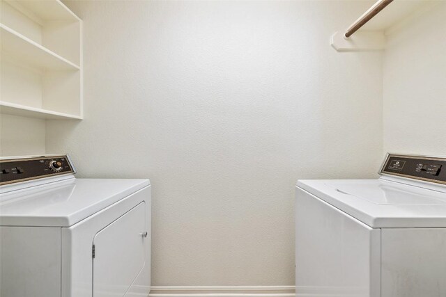 16 Troon Dr, Lakeway, TX 78738 - laundry area featuring washer and dryer