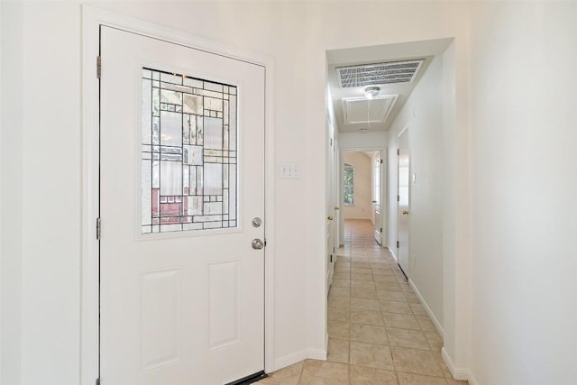 16 Troon Dr, Lakeway, TX 78738 - entryway with light tile patterned floors and baseboards