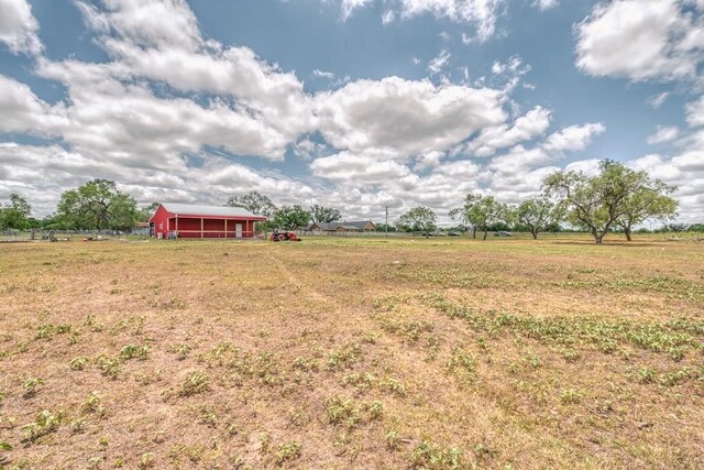 701 W Steele St, Smiley, TX 78159 - view of grassy yard featuring a view of rural / pastoral area