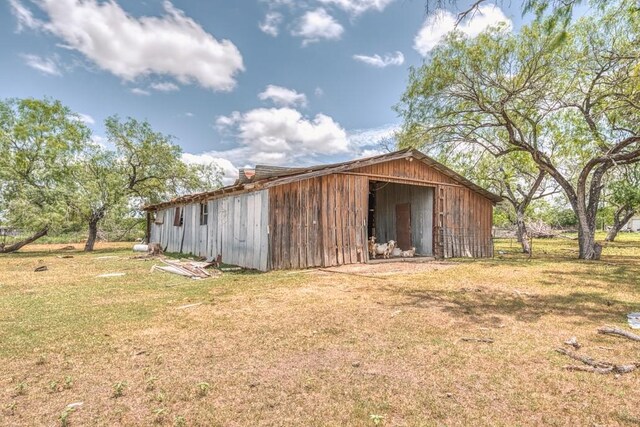 701 W Steele St, Smiley, TX 78159 - view of pole building with a yard