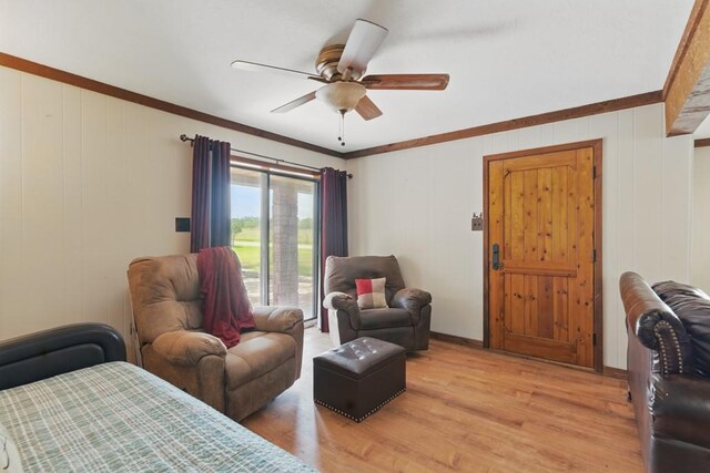 701 W Steele St, Smiley, TX 78159 - bedroom featuring light wood-type flooring, access to exterior, ornamental molding, and ceiling fan