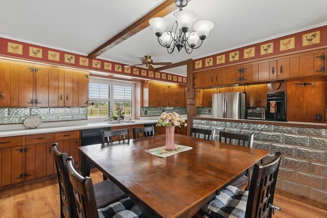 701 W Steele St, Smiley, TX 78159 - dining space with ceiling fan, light wood-style floors, a chandelier, and beamed ceiling
