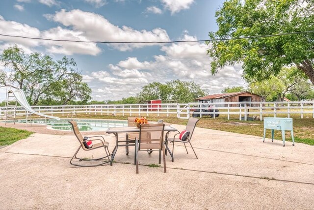701 W Steele St, Smiley, TX 78159 - view of patio with an outdoor structure