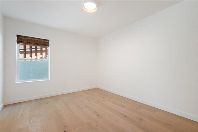 902 Challenger St, Lakeway, TX 78734 - empty room with light wood finished floors and baseboards