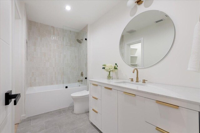 902 Challenger St, Lakeway, TX 78734 - full bath featuring toilet, vanity, shower / washtub combination, and tile patterned floors