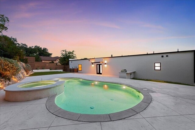 902 Challenger St, Lakeway, TX 78734 - view of swimming pool featuring a patio area and a pool with connected hot tub