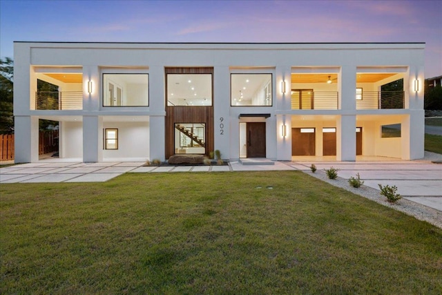 902 Challenger St, Lakeway, TX 78734 - view of front of home featuring stucco siding and a balcony