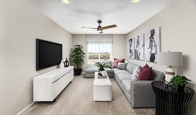20600 Ed Townes Ter, Manor, TX 78653 - living area with light carpet, baseboards, ceiling fan, and a textured ceiling
