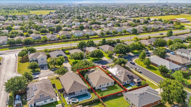 104 Lucky Clover Ln, Hutto, TX 78634 - aerial perspective of suburban area with property parcel outlined