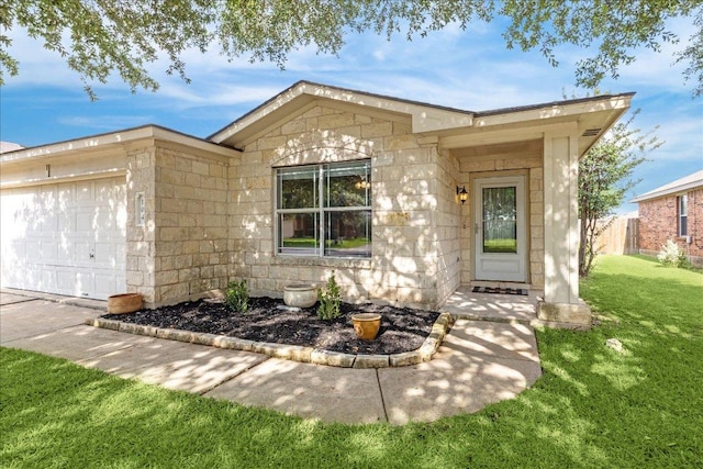 104 Lucky Clover Ln, Hutto, TX 78634 - view of front of property with a garage and stone siding