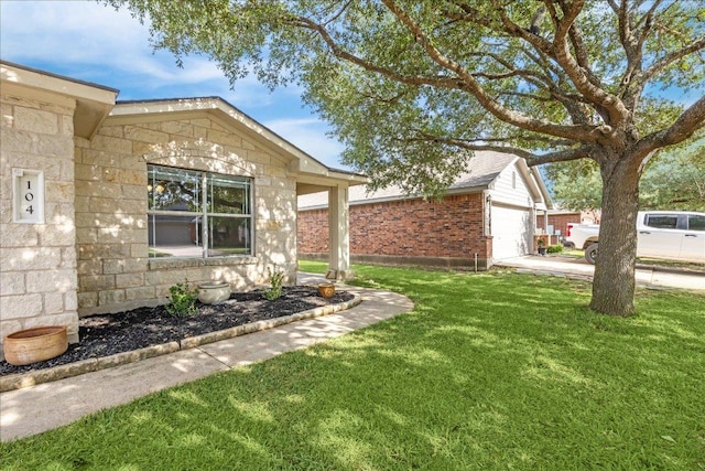 104 Lucky Clover Ln, Hutto, TX 78634 - view of home's exterior with a lawn and an outbuilding