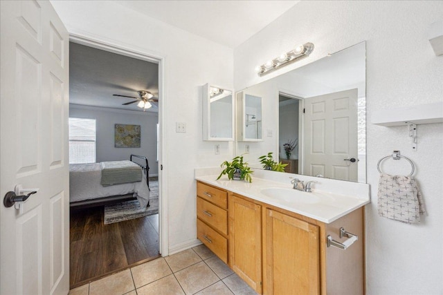 104 Lucky Clover Ln, Hutto, TX 78634 - ensuite bathroom with vanity, tile patterned flooring, and a ceiling fan