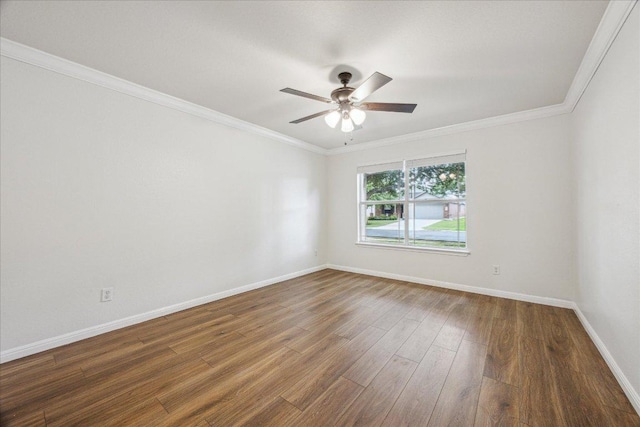 104 Lucky Clover Ln, Hutto, TX 78634 - empty room featuring wood finished floors, ceiling fan, and crown molding