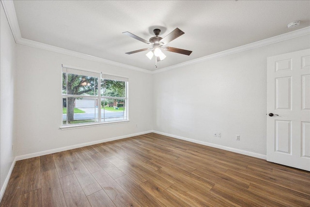 104 Lucky Clover Ln, Hutto, TX 78634 - empty room featuring wood finished floors, a ceiling fan, crown molding, and a smoke detector