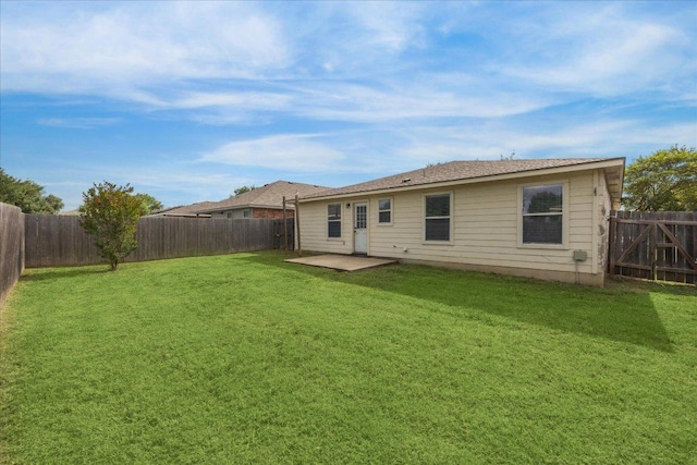 104 Lucky Clover Ln, Hutto, TX 78634 - back of property with a fenced backyard and a patio area