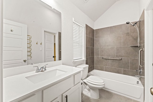 217 Magdalene Way, Liberty Hill, TX 78642 - full bathroom featuring vaulted ceiling, vanity, shower / bath combination, and tile patterned floors