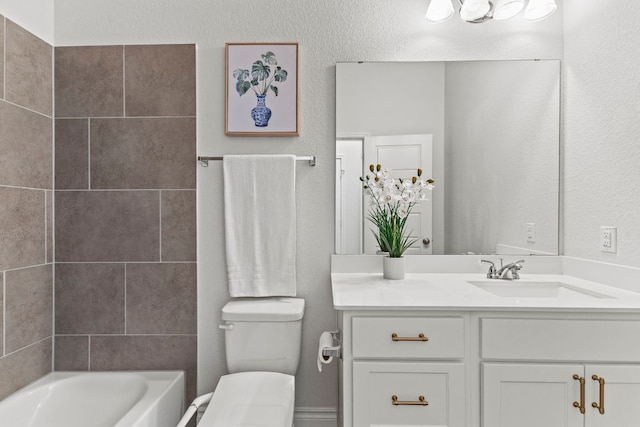 217 Magdalene Way, Liberty Hill, TX 78642 - bathroom featuring vanity, washtub / shower combination, and a textured wall