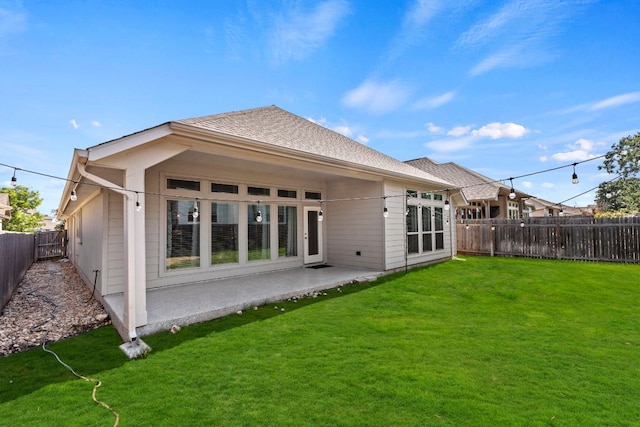 217 Magdalene Way, Liberty Hill, TX 78642 - rear view of property with a fenced backyard and a shingled roof