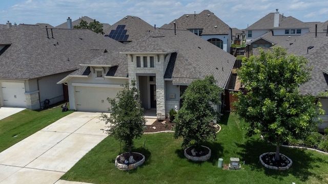 217 Magdalene Way, Liberty Hill, TX 78642 - french provincial home with driveway, a residential view, stucco siding, stone siding, and a front lawn