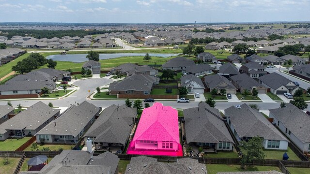 217 Magdalene Way, Liberty Hill, TX 78642 - aerial view of residential area featuring a large body of water