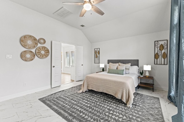 217 Magdalene Way, Liberty Hill, TX 78642 - bedroom with light marble finish floors, vaulted ceiling, and ceiling fan