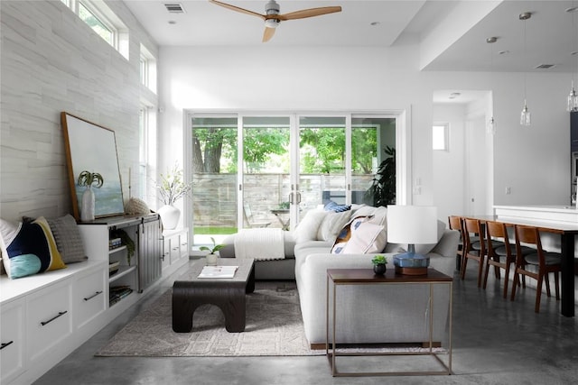 611 Fletcher St, Austin, TX 78704 - living area featuring finished concrete floors and ceiling fan