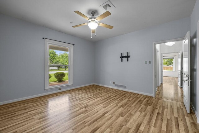 707 W Thompson Ave, Temple, TX 76501 - unfurnished room featuring healthy amount of natural light, light wood-type flooring, and baseboards