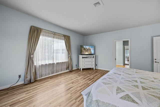 707 W Thompson Ave, Temple, TX 76501 - bedroom with wood finished floors and baseboards