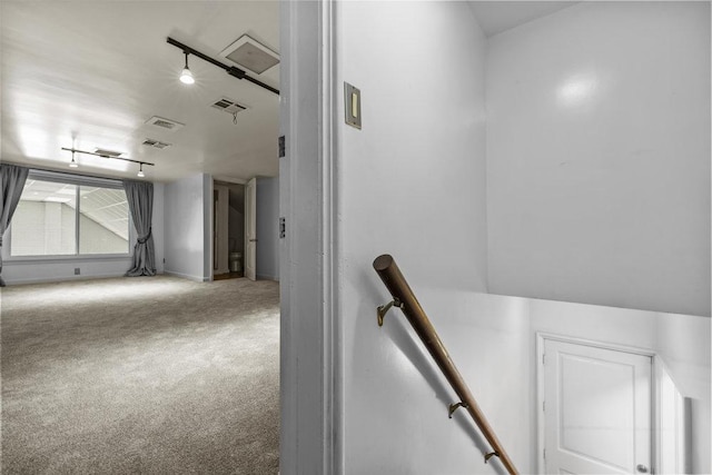 707 W Thompson Ave, Temple, TX 76501 - hall featuring an upstairs landing, carpet flooring, and baseboards