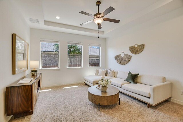 598 Naples Ln, Austin, TX 78737 - living room featuring light carpet, a tray ceiling, a ceiling fan, baseboards, and recessed lighting