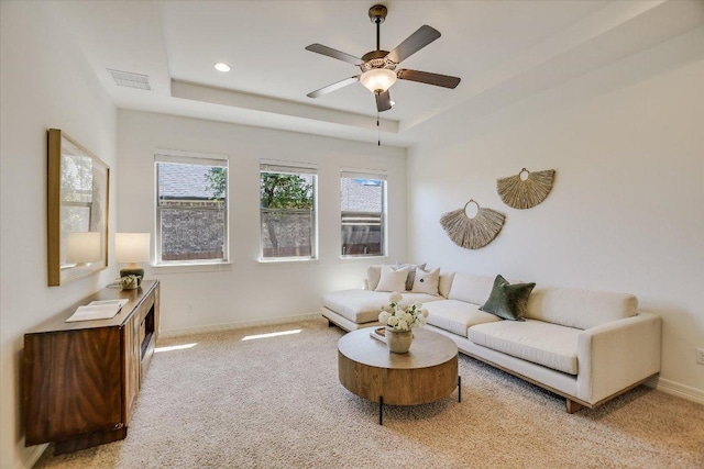 598 Naples Ln, Austin, TX 78737 - living area with light colored carpet, a tray ceiling, ceiling fan, and recessed lighting