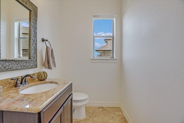 598 Naples Ln, Austin, TX 78737 - bathroom with baseboards, vanity, and toilet
