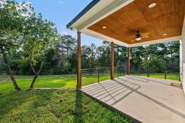 121 Mokolii Ct, Bastrop, TX 78602 - view of patio / terrace with a ceiling fan and view of wooded area