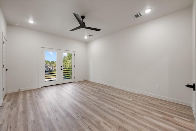 121 Mokolii Ct, Bastrop, TX 78602 - spare room featuring french doors, ceiling fan, light wood-style floors, baseboards, and recessed lighting