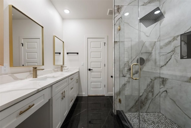 121 Mokolii Ct, Bastrop, TX 78602 - full bathroom with double vanity, a marble finish shower, tile patterned floors, and recessed lighting
