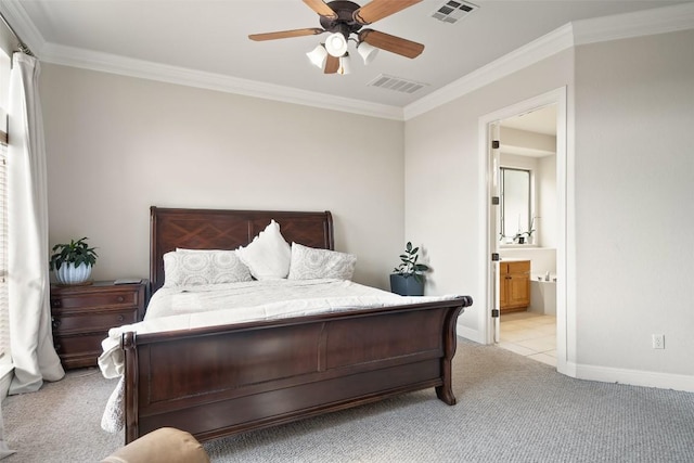 9904 Chester Cv, Austin, TX 78750 - bedroom featuring light carpet, ornamental molding, baseboards, connected bathroom, and a ceiling fan