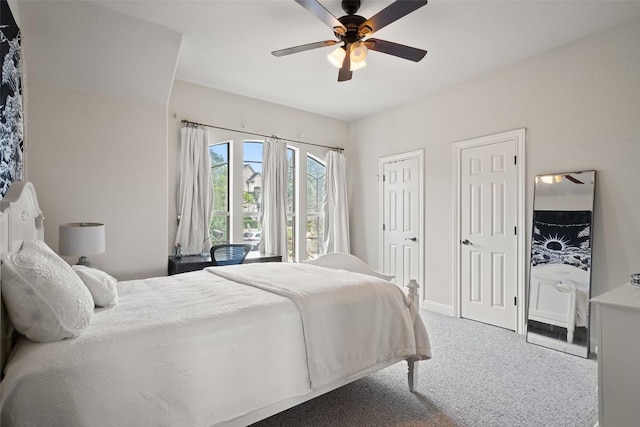 9904 Chester Cv, Austin, TX 78750 - carpeted bedroom with two closets and ceiling fan
