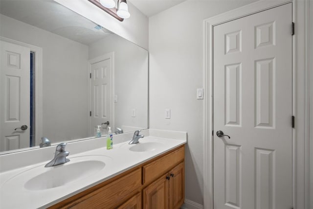 9904 Chester Cv, Austin, TX 78750 - bathroom featuring double vanity
